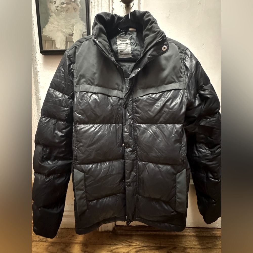 Puffer winter jacket from Reebok
100% polyamide waterproof 
70% duck feathers